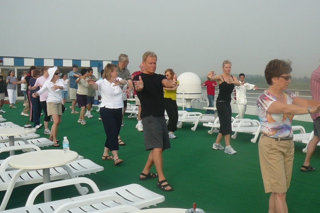 Picture of Nancy and others doing Tai Chi in the mornings on the Yangtze River