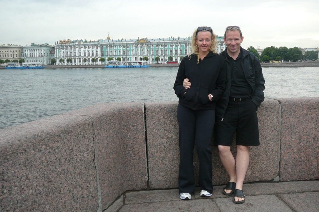 Nancy & Shawn in Saint Petersburg, Russia with the Hermitage Museum in the background