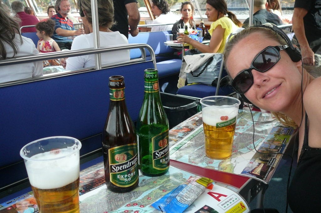 Nancy enjoying a local Spendrups Beer during our Stockholm city boat tour