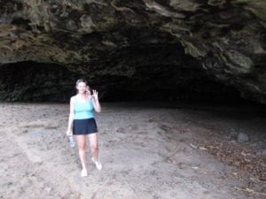 Nancy Power checking out the cave by Tunnels Beach in Kauai, Hawaii