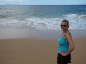 Nancy checking out Papohaku Beach in Molokai, Hawaii