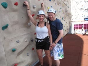 Nancy and Shawn rock climbing and having fun on a cruise