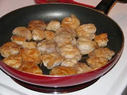 A picture of cod tongues in a frying pan