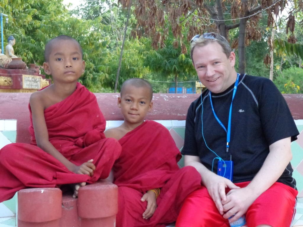 Shawn with two Myanmar children Monks during our AMA Waterways River Cruise on the Irrawaddy River in Myanmar